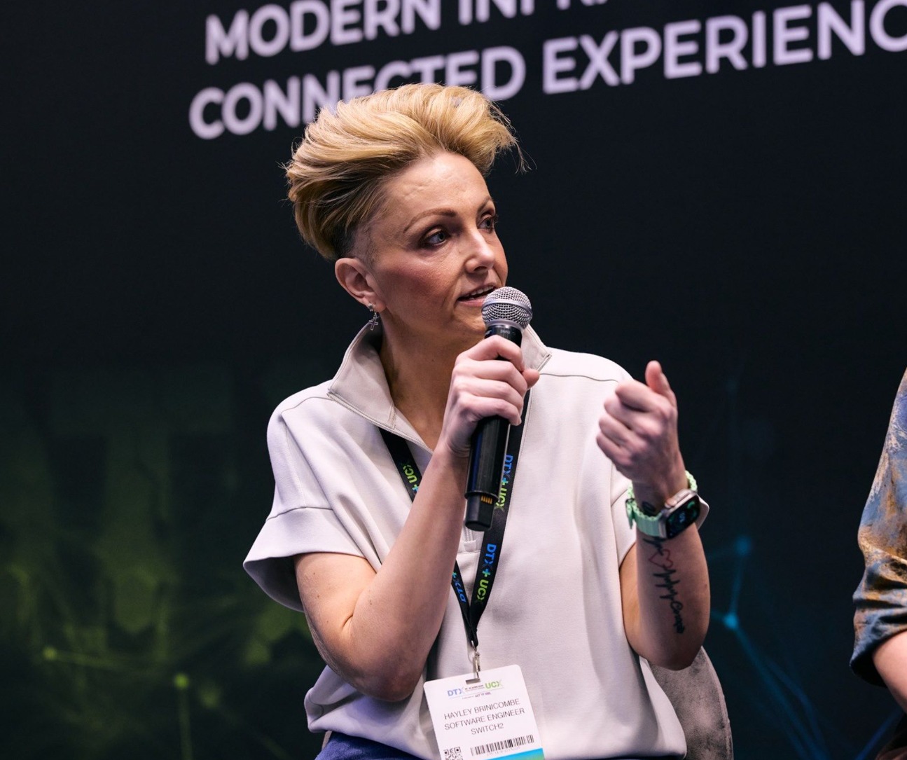 Hayley Brinicombe speaking on stage at DTX Manchester